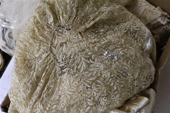 Two ornate babys 19th century christening capes, a silk and lace wedding train, waxed headdress and veil